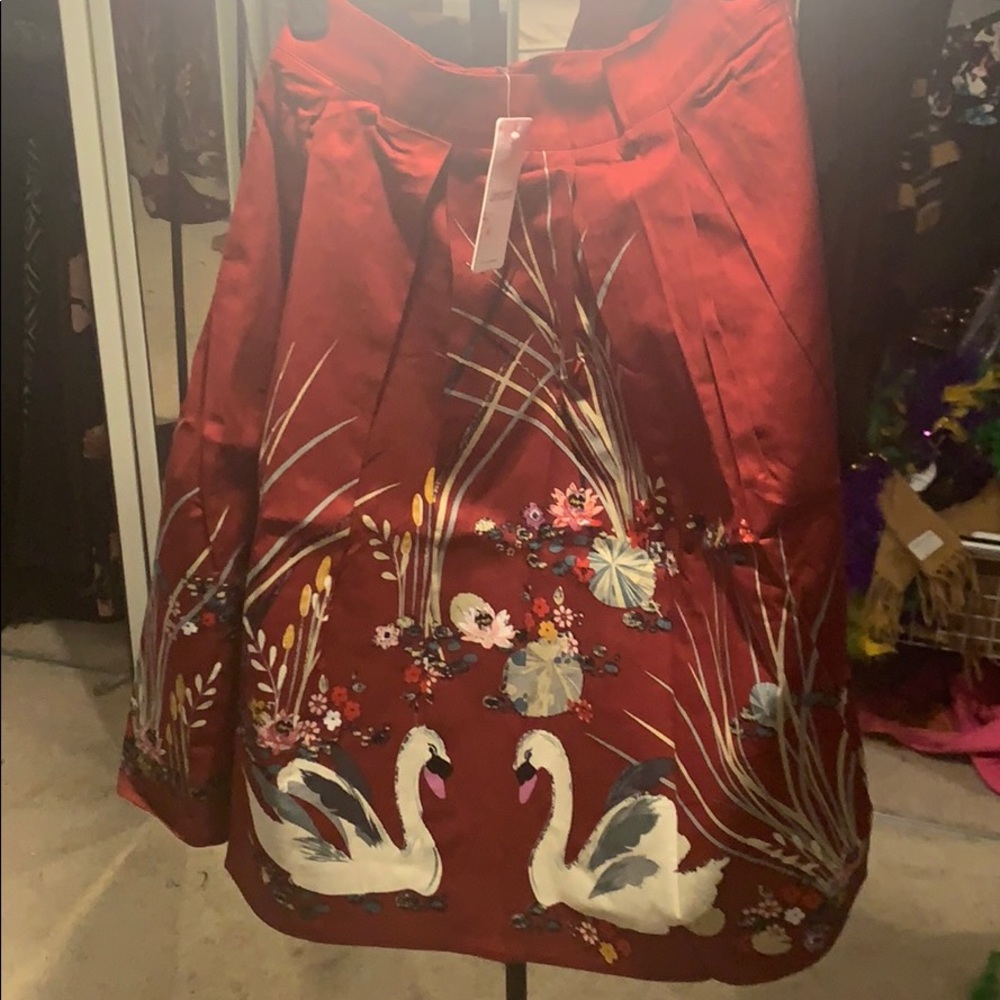 Red skirt with swan designs